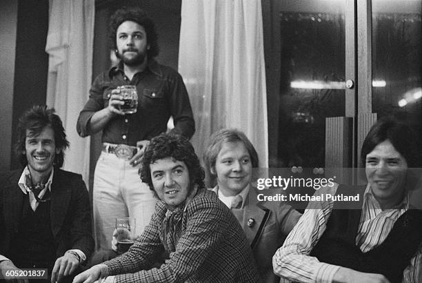 English singer-songwriter and guitarist Ronnie Lane with his band, Slim Chance, 6th January 1976. Left to right: Charlie Hart, Steve Simpson, Ronnie...