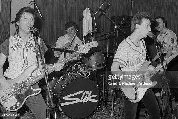 Scottish pop group Slik performing on stage, London, January 1976. Left to right: Jim McGinlay, Kenny Hyslop, Midge Ure and Billy McIsaac.