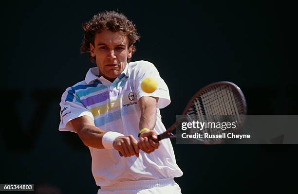 Mats Wilander of Sweden makes a double hand return during his Men's Singles Semi Final match against Alberto Mancini at the Monte Carlo Open Tennis...