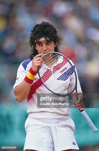 Arantxa Sanchez Vicario from Spain kisses her racquet during the Women's Singles Final match against Steffi Graf of Germany at the French Open Tennis...