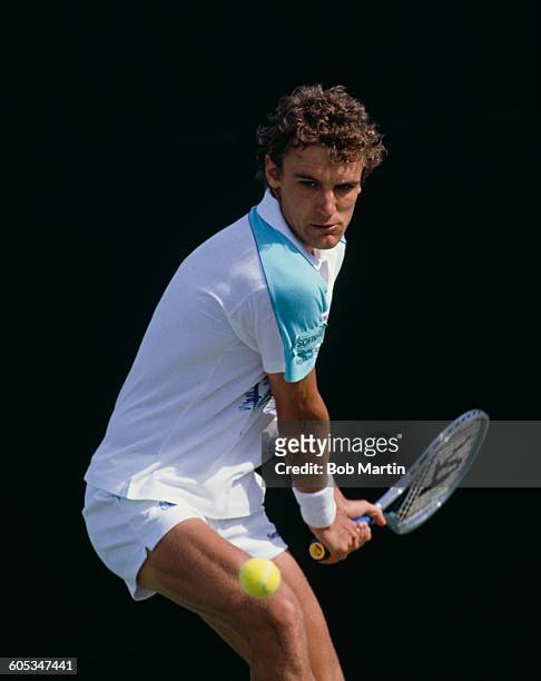 Mats Wilander of Sweden makes a double hand return during a Men's Singles match at the ATP Lipton International Players Championship on 15 March 1988...