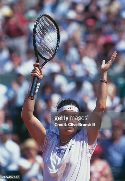Arantxa Sanchez Vicario of Spain makes a double hand return during the Women's Singles Semi Final match against Jana Novotna at the French Open...