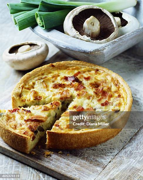 ham, mushroom and leek quiche on white washed chopping board - white mushroom ストックフォトと画像