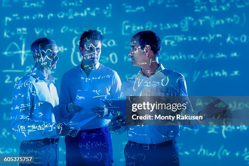 Scientists with projected mathematical data Scientists with projected mathematical data