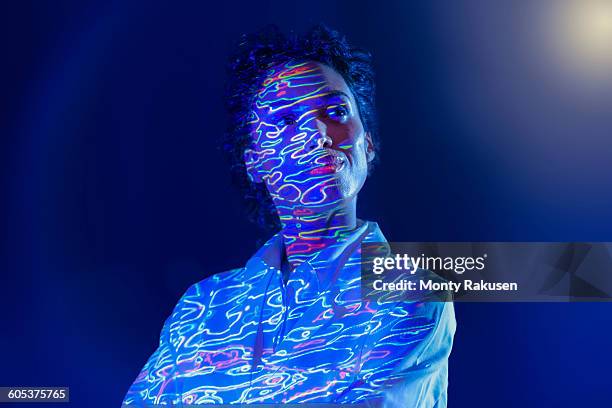 portrait of female scientist with graphical geological data projection - groundbreaking female scientists stock pictures, royalty-free photos & images