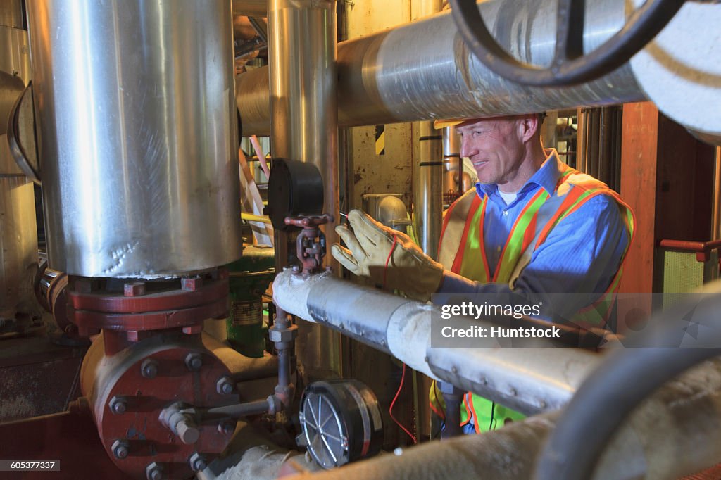 Engineer Testing Signal Path Engineer In Electric Power Plant Testing A Transducer Electrical Signal ...