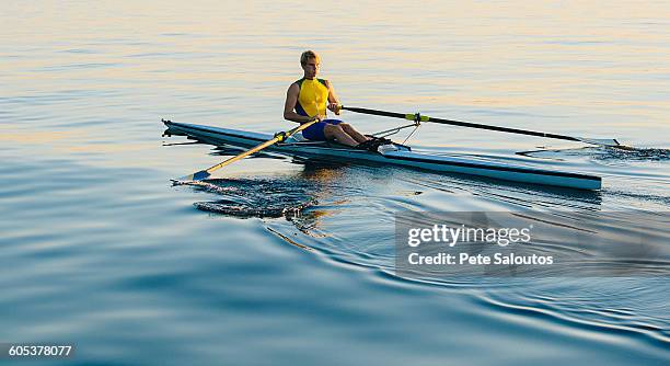 teenage boy, sculling - north pacific stock pictures, royalty-free photos & images