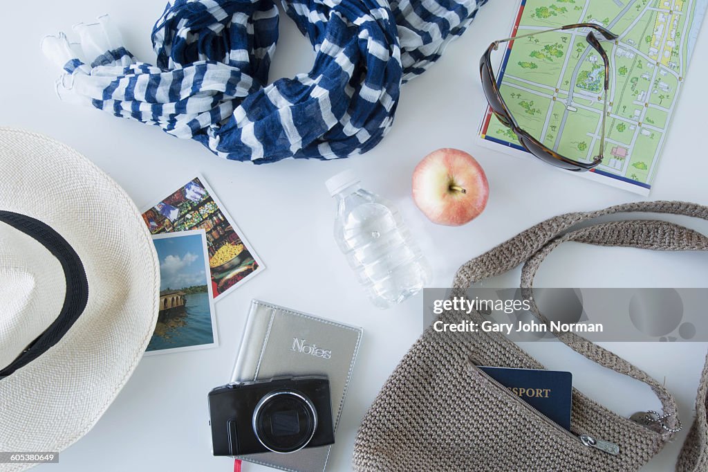 Overhead view of items being prepared for sightseeing on city break