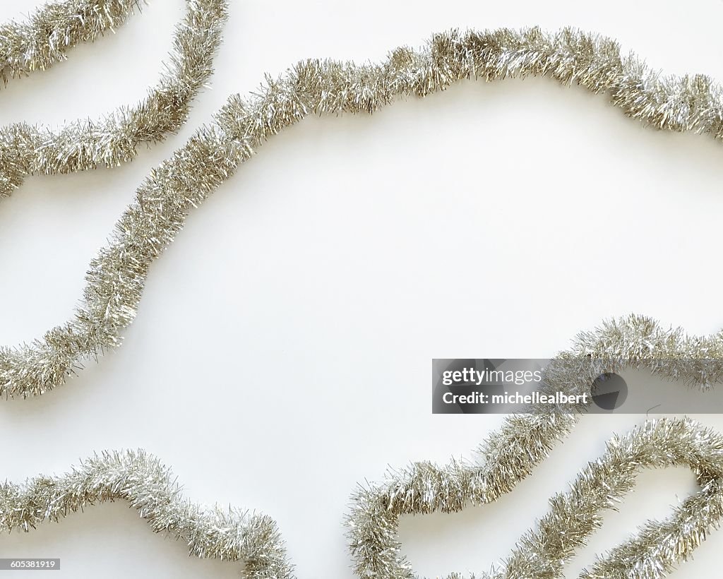 Silver tinsel on a white background