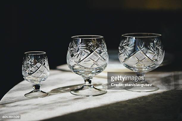 three crystal glasses - crystal glasses stockfoto's en -beelden