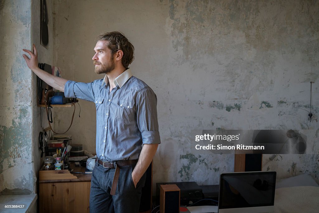 Handsome young man at home