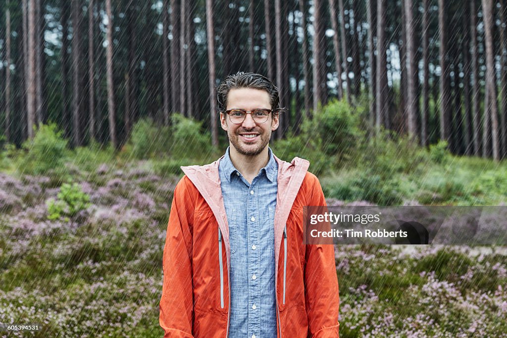 Portrait of man in outdoor clothes, bad weather.