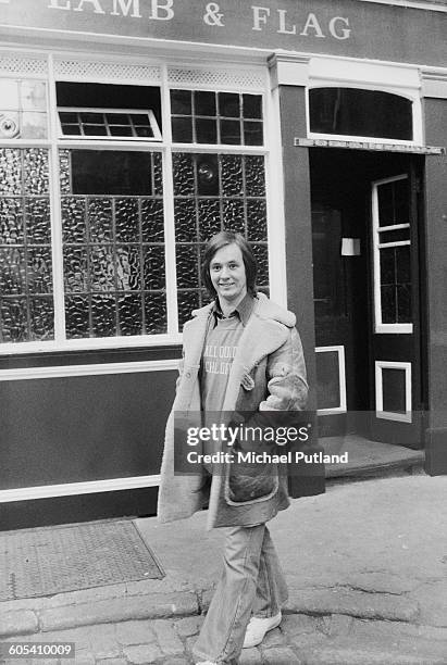 Welsh singer, songwriter and guitarist Andy Fairweather Low, outside the Lamb & Flag pub in Covent Garden, London, 30th December 1975.