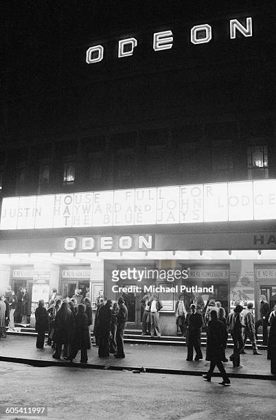 Fans outside the Hammersmith Odeon at a concert by John Lodge and Justin Hayward of the Moody Blues, who are performing music from their 'Blue Jays'...