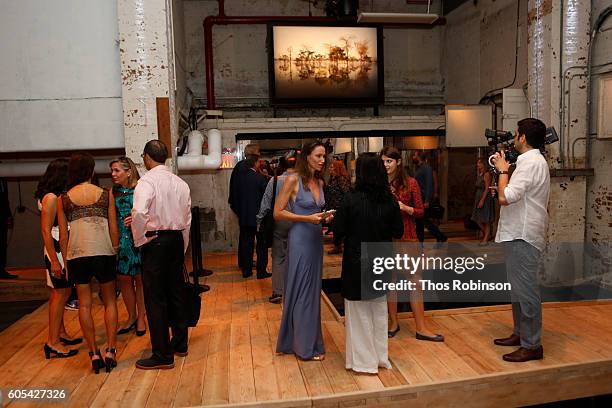 Artist Anne de Carbuccia speaks with guests at ONE: One Planet One Future at Bank Street Theater on September 13, 2016 in New York City.