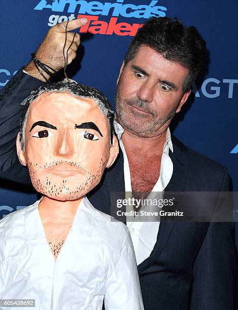 Simon Cowell arrives at the "America's Got Talent" Season 11 Finale Live Show at Dolby Theatre on September 13, 2016 in Hollywood, California.