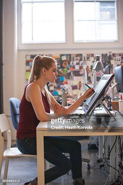 young workers in creative office space. - technofiel stockfoto's en -beelden