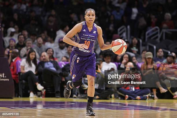 Lindsey Harding of the Phoenix Mercury handles the ball against the Los Angeles Sparks during a WNBA basketball game at Staples Center on September...