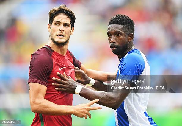 Paciencia of Portugal is challenged by Johnny Palacios of Honduras during the Olympic Men's Football match between Honduras and Portugal at Olympic...