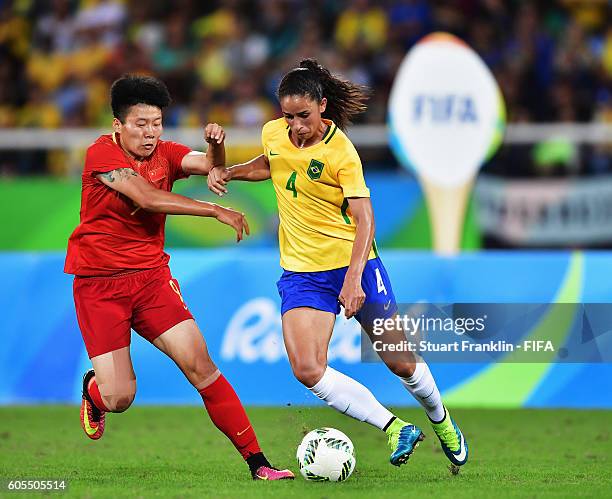 Rafaelle of Brazil is challenged by Xiaoxu Ma of China during the Olympic Women's Football match between Brazil and China PR during at Olympic...