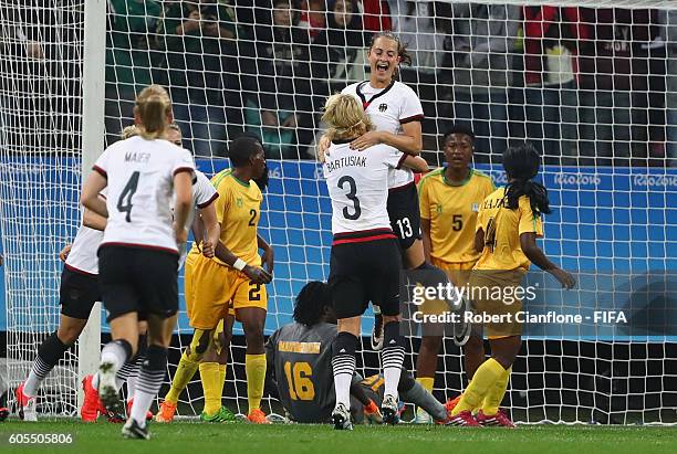 Sara Daebritz of Germany celebrates after scoring a goal during the Women's First Round Group F match between Zimbabwe and Germany at Arena...