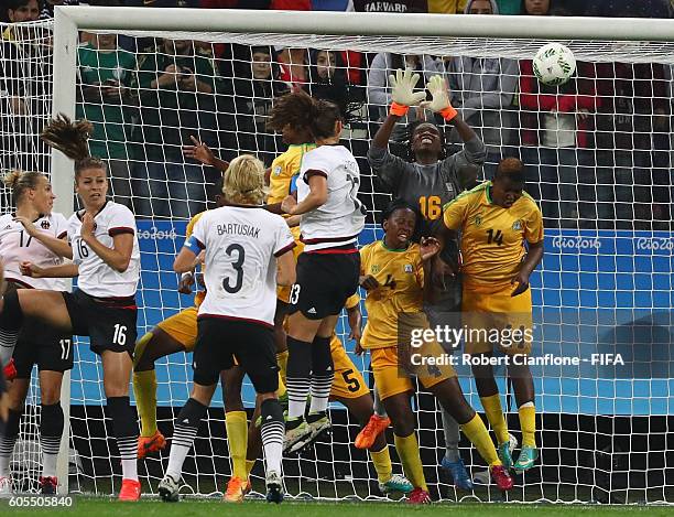 Sara Daebritz of Germany heads the ball past Lindiwe Magwede of Zimbabwe to score during the Women's First Round Group F match between Zimbabwe and...