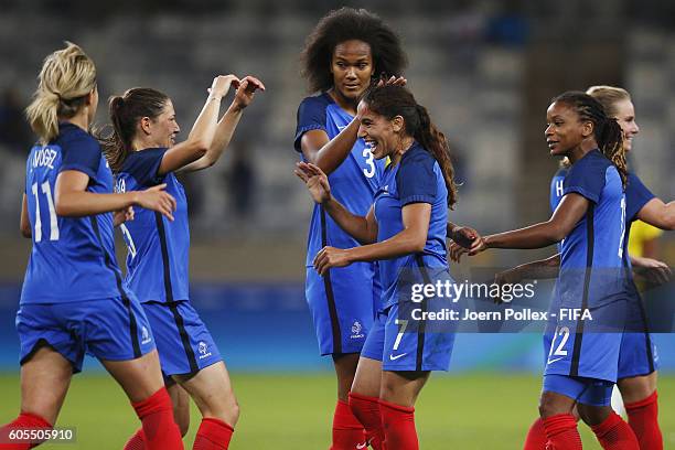 Amel Majri of France celebrates with her team mates after scoring her team's fourth goal during Women's Group G match between France and Colombia on...