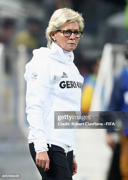 German coach Silvia Neid looks on during the Women's First Round Group F match between Zimbabwe and Germany at Arena Corinthians on August 3, 2016 in...