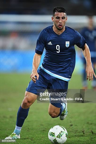 Jonathan Calleri of Argentina in action during the Olympic Men's Football match between Argentina and Algeria at Olympic Stadium on August 7, 2016 in...