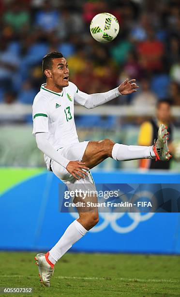 Oussama Darfalou of Algeria in action during the Olympic Men's Football match between Argentina and Algeria at Olympic Stadium on August 7, 2016 in...