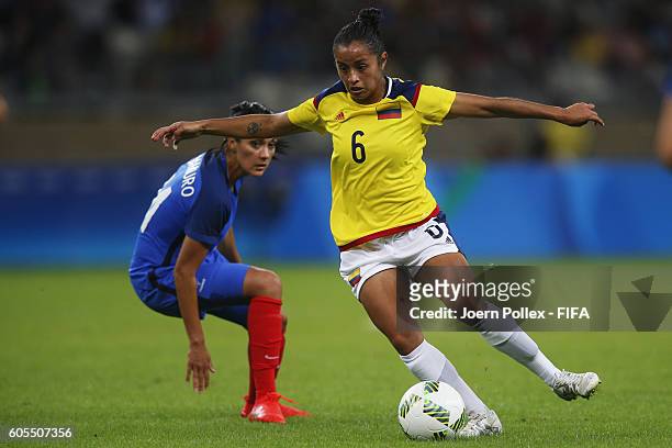 Louisa Cadamuro of France and Liana Salazar of Columbia compete for the ball during Women's Group G match between France and Colombia on Day -2 of...