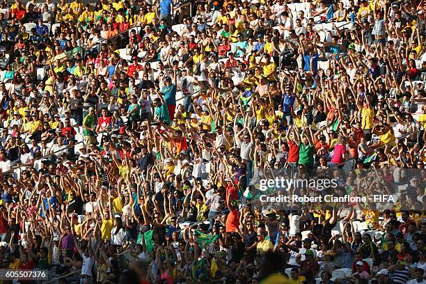 The crowd cheers during the Women's First Round Group F match between Canada and Zimbabwe on Day 1 of the Rio 2016 Olympic Games at Arena Corinthians...