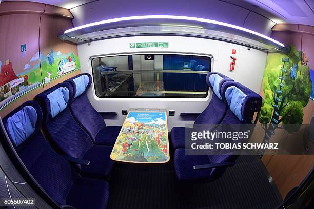 The children's and family compartment of a new ICE 4 high speed train of German railway operator Deutsche Bahn is pictured in Berlin on September 13,...