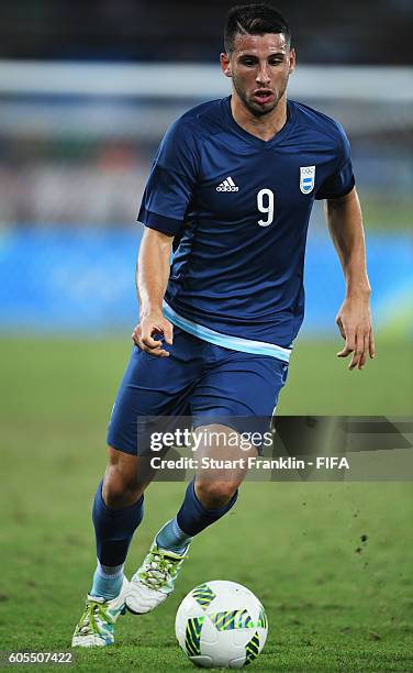 Jonathan Calleri of Argentina in action during the Olympic Men's Football match between Argentina and Algeria at Olympic Stadium on August 7, 2016 in...