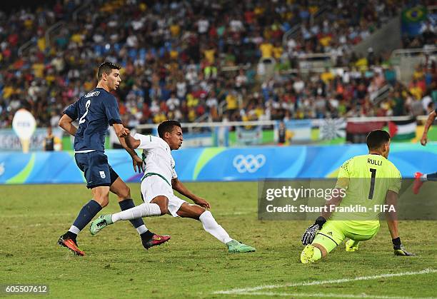 Sofiiane Bendebka of Algeria scores his goal during the Olympic Men's Football match between Argentina and Algeria at Olympic Stadium on August 7,...