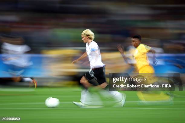 Saskia Bartusiak of Germany runs with the ball during the Women's First Round Group F match between Zimbabwe and Germany at Arena Corinthians on...