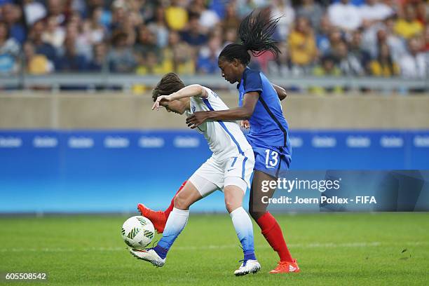 Meghan Koingernberg of USA and Kadidiatou Diani of France compete for the ball during Women's Group G match between USA and France on Day 1 of the...
