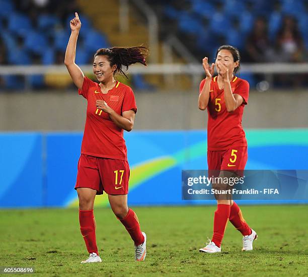 Gu Yasha of China celebrates scoring her goal during the Olympic Women's Football match between South Africa and China PR at Olympic Stadium on...