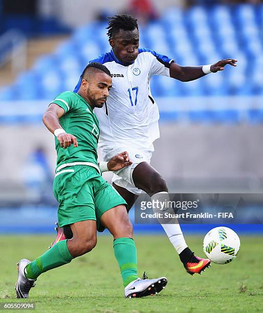 Alberth Elis of Honduras is challenged by Houari Ferhani of Algeria during the Olympic Men's Football match between Honduras and Algeria at Olympic...