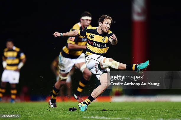 Marty McKenzie of Taranaki kicks a penalty during the round five Mitre 10 Cup match between Counties Manukau and Taranaki at ECOLight Stadium on...