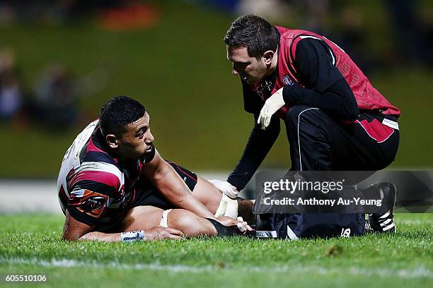 Jimmy Tupou of Counties Manukau receives medical attention with an injury during the round five Mitre 10 Cup match between Counties Manukau and...