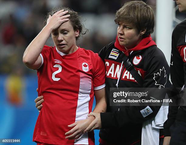 Allysha Chapman of Canada leaves the ground with an injury during the Women's Football Quarter Final match between Canada and France on Day 7 of the...