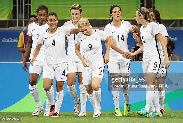 Eugenie le Sommer of France celebrates with her team mates after scoring a goal during the Women's Football match between New Zealand and France on...