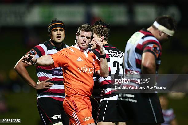 Referee Jamie Nutbrown makes a call during the round five Mitre 10 Cup match between Counties Manukau and Taranaki at ECOLight Stadium on September...