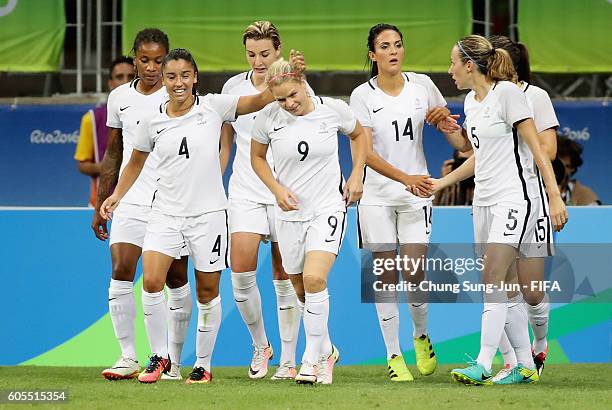 Eugenie le Sommer of France celebrates with her team mates after scoring a goal during the Women's Football match between New Zealand and France on...