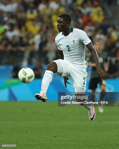 Muenfuh Sincere of Nigeria controls the ball during the Men's Football Semi Final between Nigeria and Germany on Day 12 of the Rio 2016 Olympic Games...