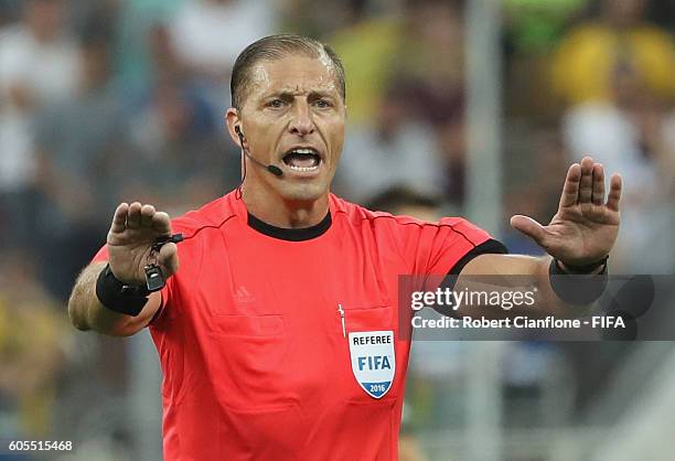 Referee Nestor Pitana gestures during the Men's Football Semi Final between Nigeria and Germany on Day 12 of the Rio 2016 Olympic Games at Arena...