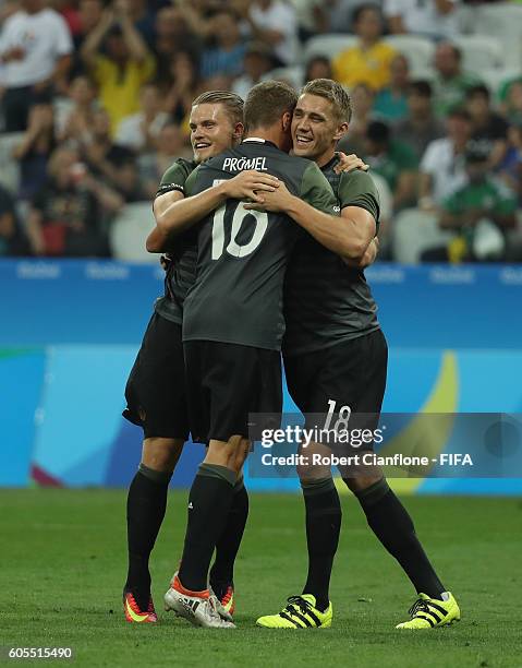 Nils Petersen of Germany celebrates with team mates after scoring a goal during the Men's Football Semi Final between Nigeria and Germany on Day 12...