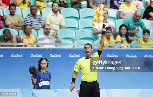 Assistant referee looks on during the Men's Football Quarter Final match between Nigeria and Denmark on Day 8 of the Rio 2016 Olympic Games at Arena...