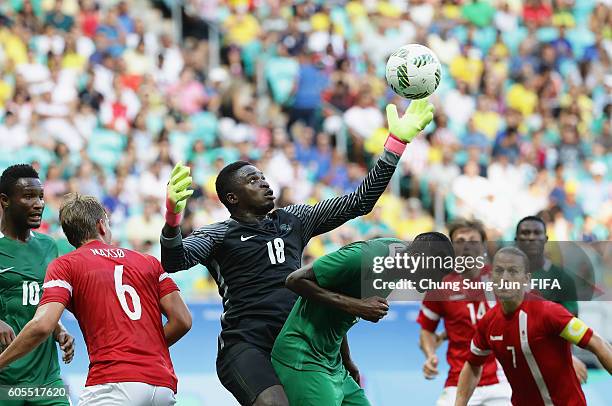 Goalkeeper Emmanuel Daniel of Nigeria catchs the ball during the Men's Football Quarter Final match between Nigeria and Denmark on Day 8 of the Rio...